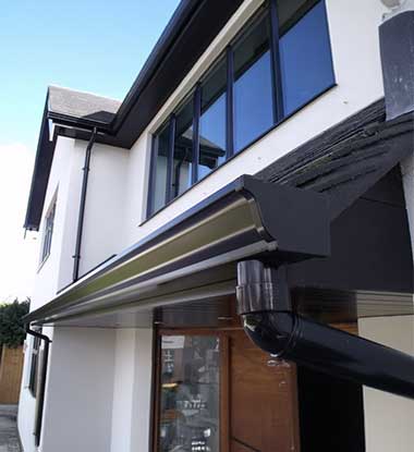 Close up of modern aluminum gutters on a Harford County property