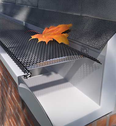 Close up of new gutter guards preventing debris in Howard County