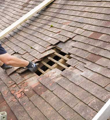 Shingle repair project underway on a Howard County residence